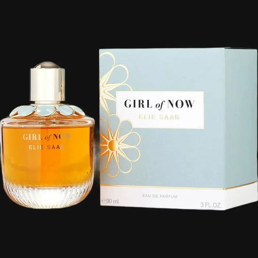 Women's eau de parfum bottle with amber liquid and gold cap, Elie Saab label