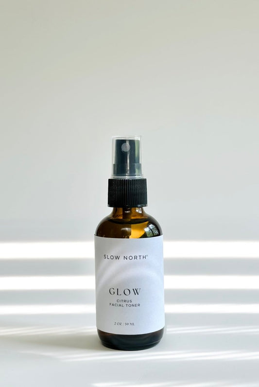 Glow Citrus Refresh Facial Toner spray bottle, amber glass with black pump cap