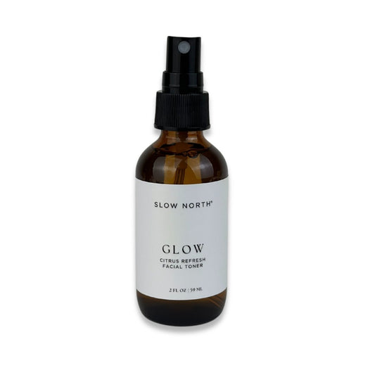 Glow Citrus Refresh Facial Toner bottle with black spray pump, 2 fl oz