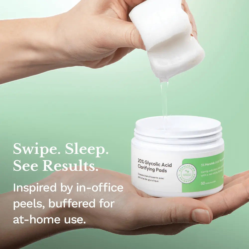 Hands holding a jar of clarifying peel pads as white liquid pours