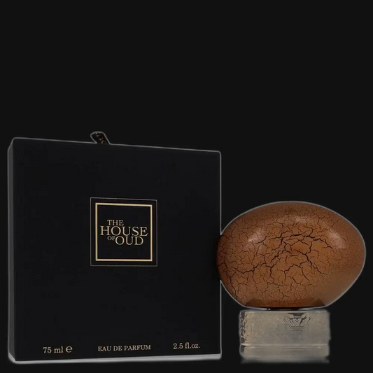 Eau de parfum spray bottle with amber-brown globe cap and matching black box