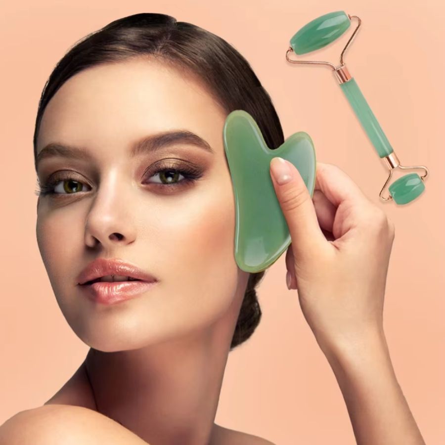 Green jade gua sha facial scraper with curved edge and smooth handle