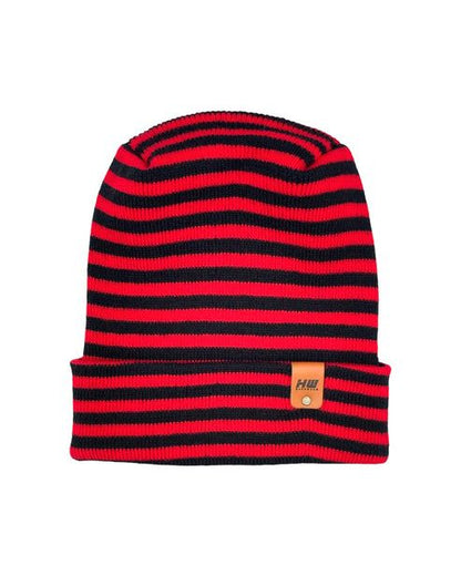 Red and black striped beanie with cuff and small tan brand patch