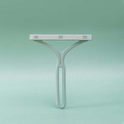 Handheld lint remover tool with cartridge head and tapered long handle