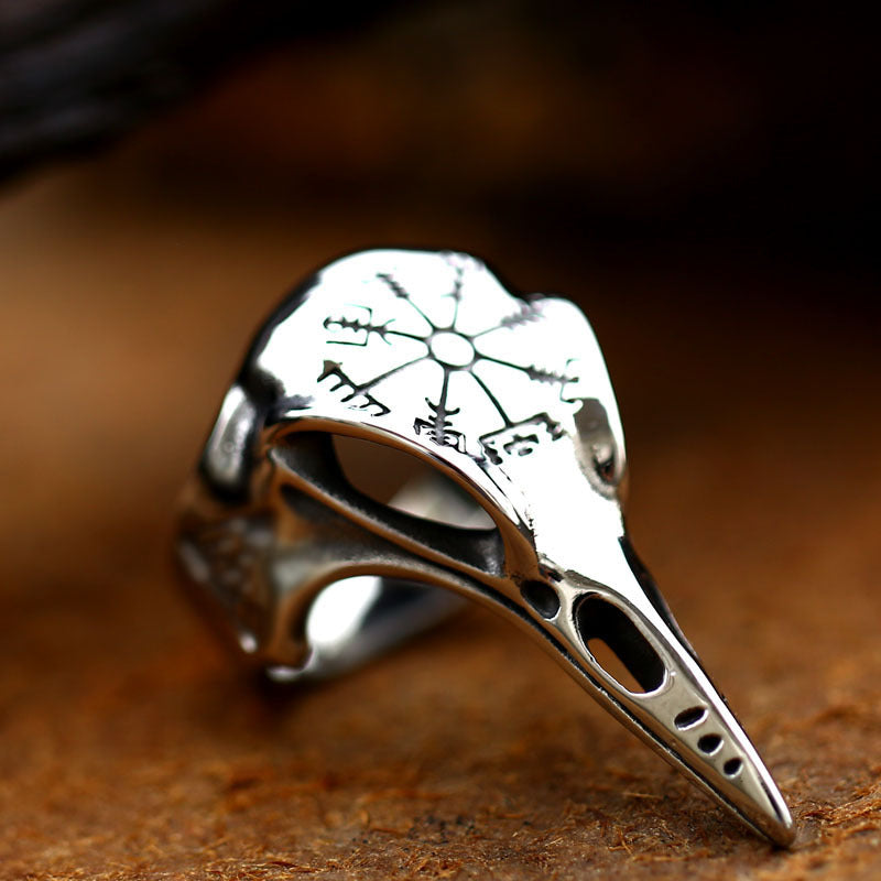 Silver gothic ring with rune-and-snowflake engraving and pointed claw setting