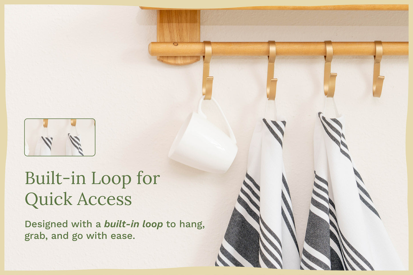 Kitchen towels with black-and-white stripes hanging on a rod, looped edge visible.