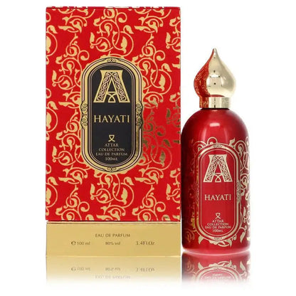 Unisex eau de parfum bottle with red label and gold spray cap, beside matching box