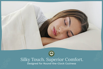 White bed sheet set and pillowcase on a sleeping person