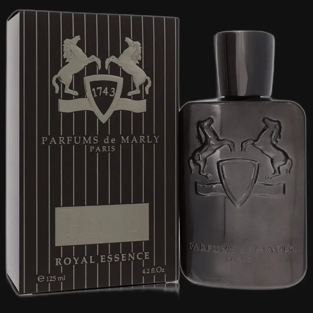 Men's cologne bottle with dark finish, silver cap, next to Royal Essence striped box