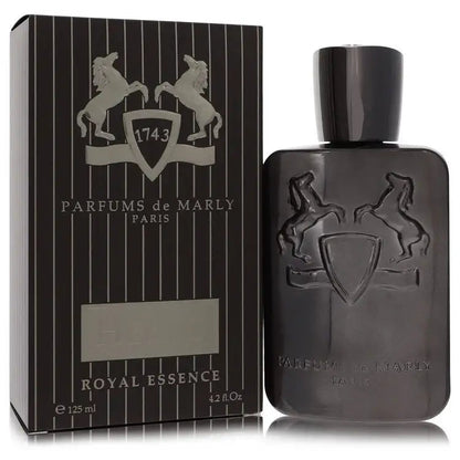 Men's cologne bottle with silver cap and shield crest, shown beside striped dark box