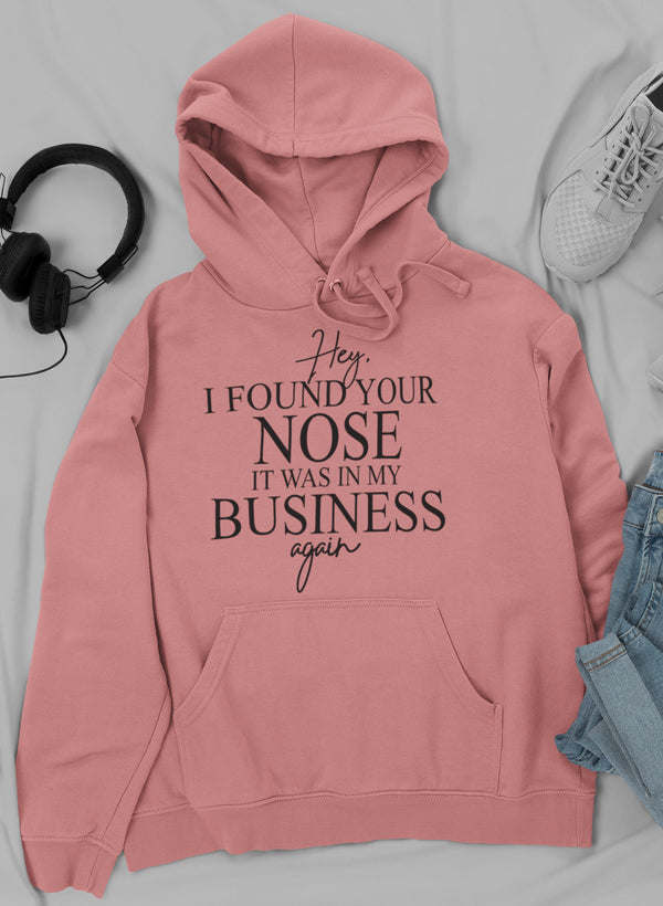 Pink graphic hoodie with 'I FOUND YOUR NOSE' text, hood and front pouch pocket