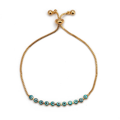 Charm bracelet with gold cord and row of blue evil-eye beads with clasp