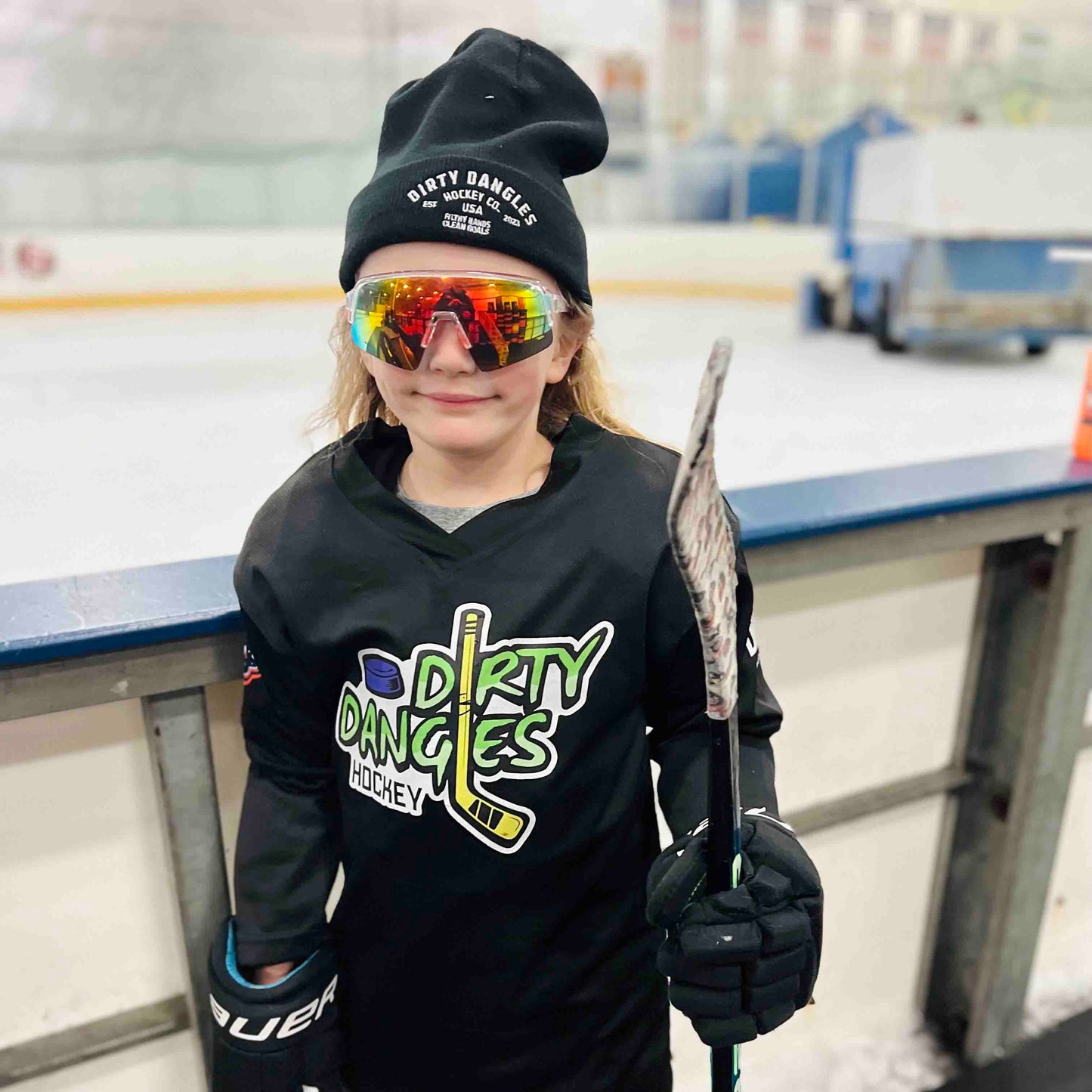 Black practice jersey with Dirty Dangles Hockey logo on chest