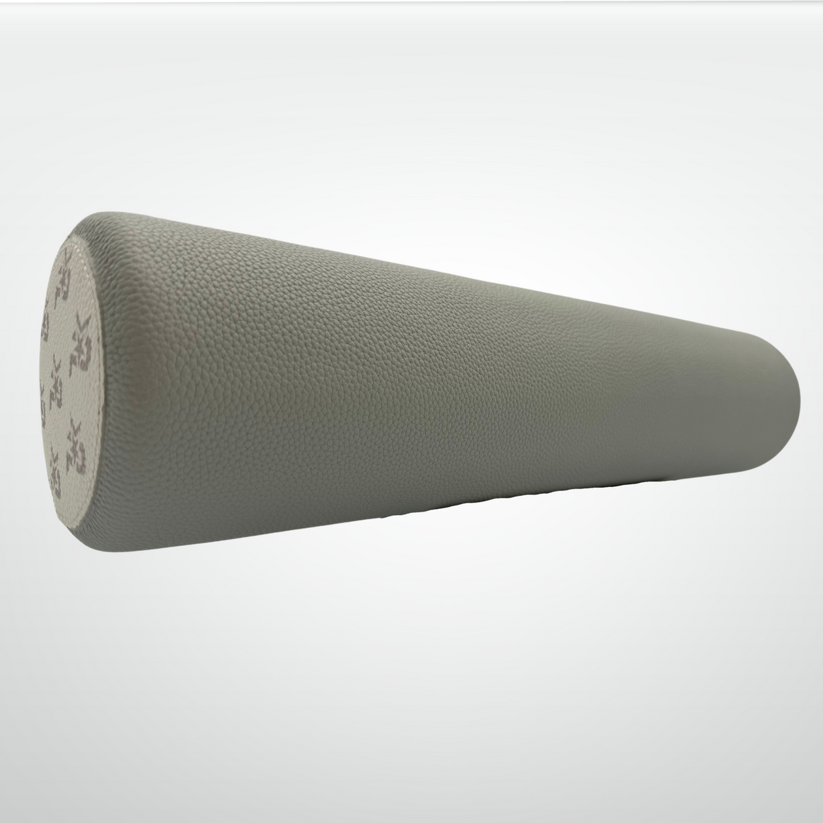 Leather-wrapped cork massage roller, pale gray textured cylinder