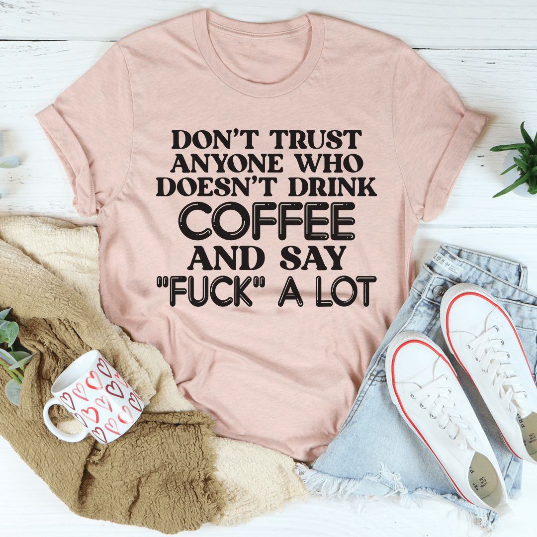 Mauve T-shirt with bold 'COFFEE' slogan and 'FUCK' A LOT text print