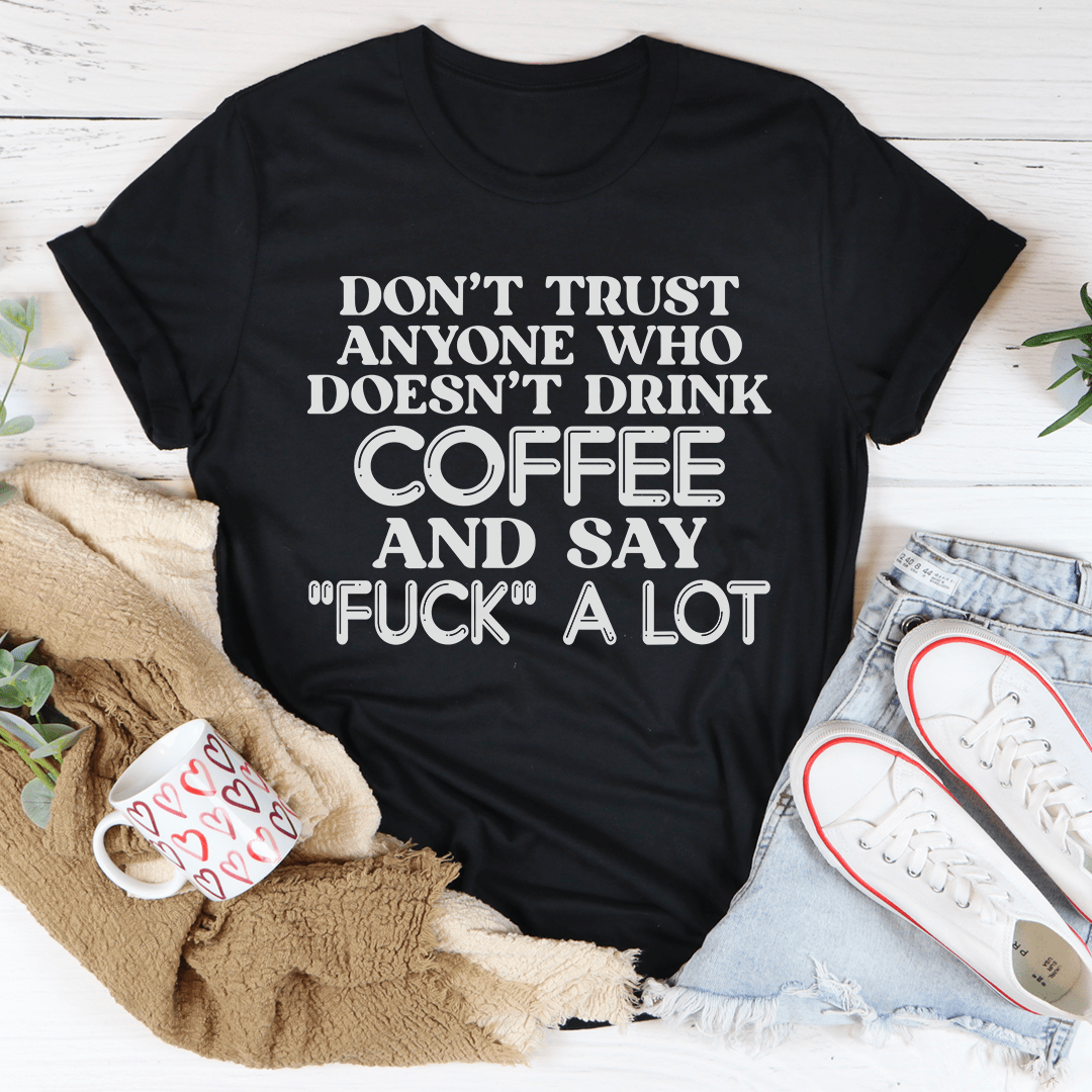 Black crew-neck T-shirt featuring 'DON'T TRUST' and 'COFFEE' typography