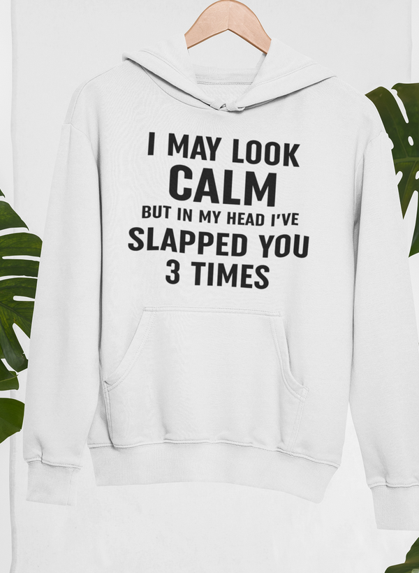 White hoodie with front pocket and chest slogan print: I May Look Calm