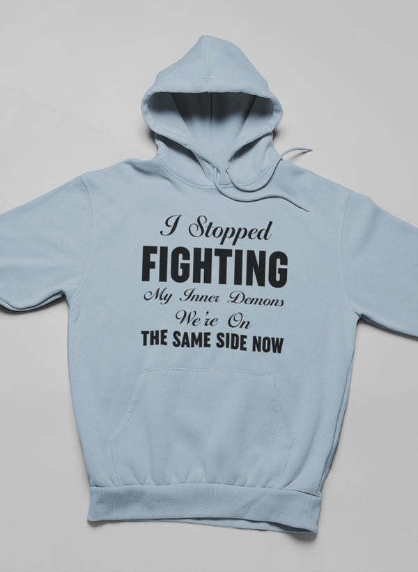 Light blue pullover hoodie with front text graphic and kangaroo pocket