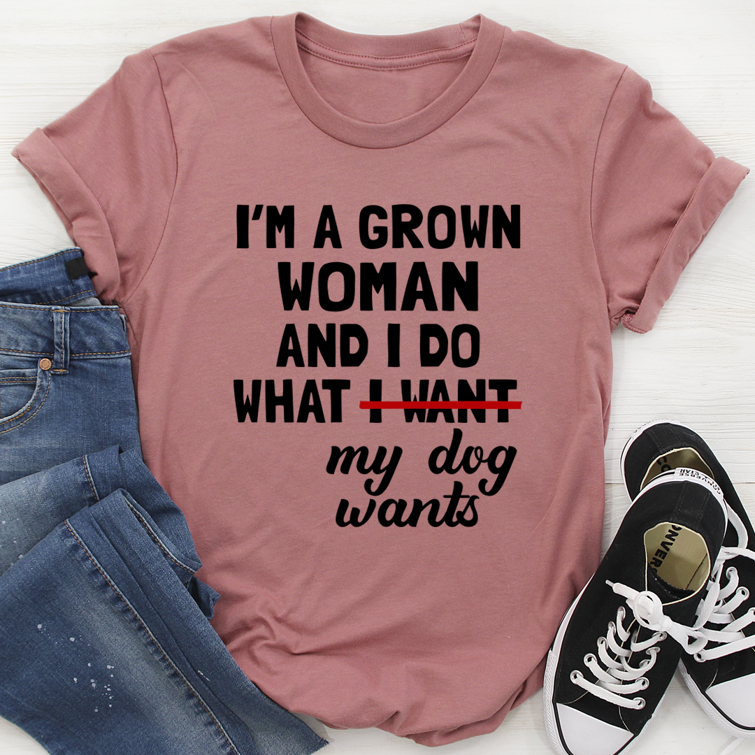 Mauve crewneck T-shirt with bold text slogan and cursive “my dog wants”