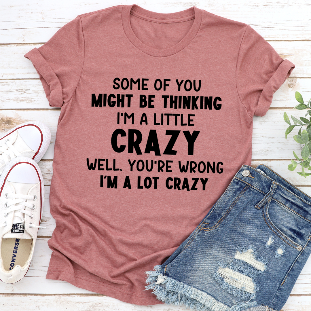 Mauve crewneck short-sleeve t-shirt with black and white quote graphic: CRAZY
