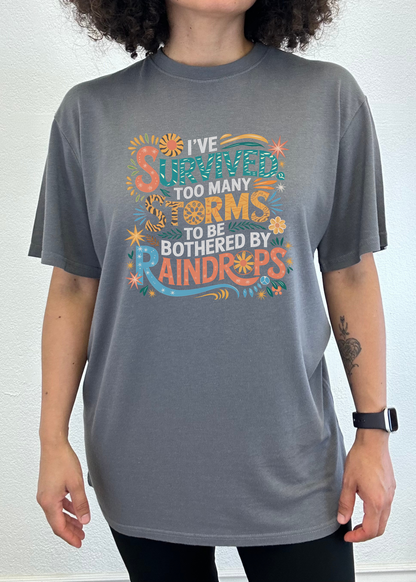 I've Survived Too Many Storms to Be Both Unisex Bamboo/Cotton Graphic T-Shirt - Renee Lane Company