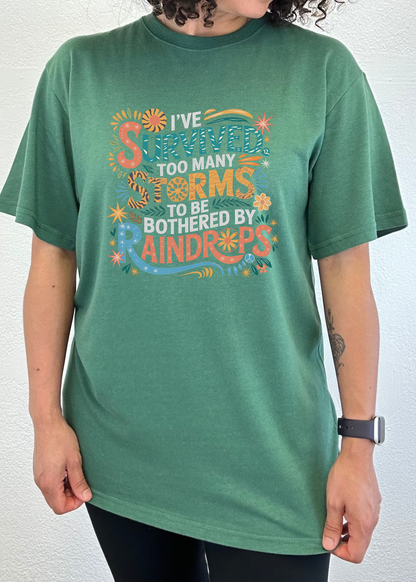I've Survived Too Many Storms to Be Both Unisex Bamboo/Cotton Graphic T-Shirt - Renee Lane Company