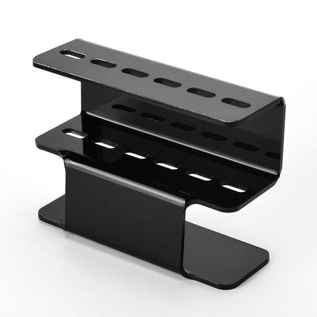 Black acrylic eyelash tweezer holder with two tiers and cutout slot rows
