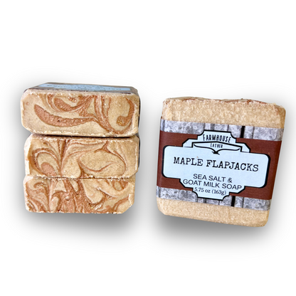 Maple flapjacks sea salt soap bars, stacked with decorative swirl and side label.