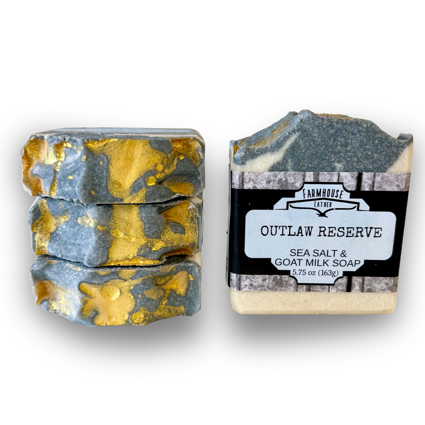 Marbled blue-gray and gold sea salt soap bar, label visible on wrapper side