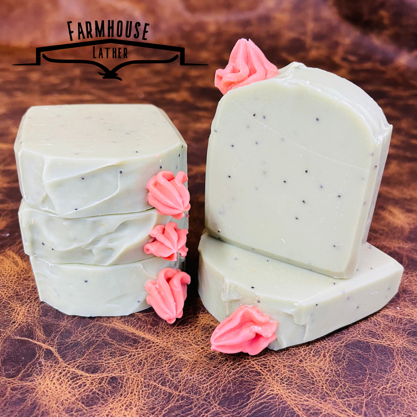 Cactus Blossom soap bars in pale green with pink flower accents, stacked