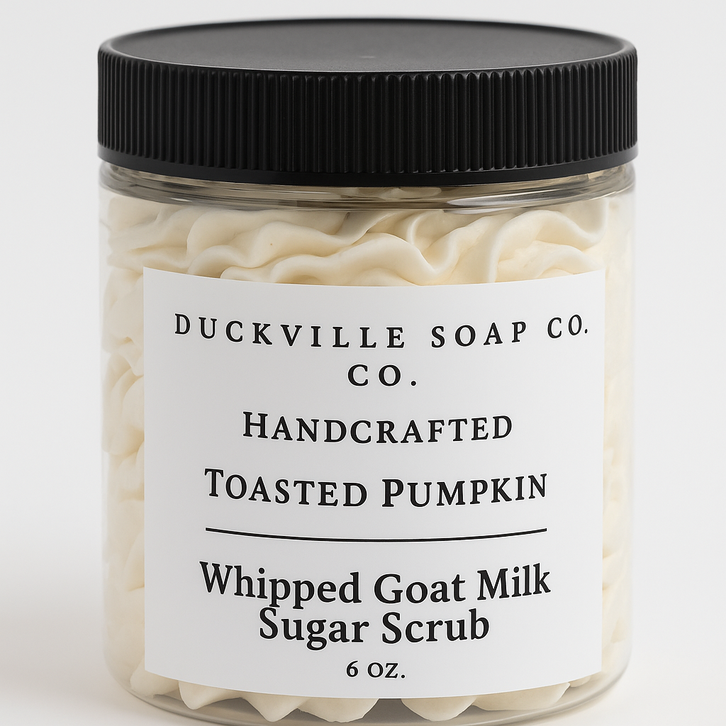 Whipped goat milk sugar scrub jar, Toasted Pumpkin label, black lid, cream flakes