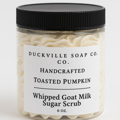Whipped goat milk sugar scrub jar, Toasted Pumpkin label, black lid, cream flakes