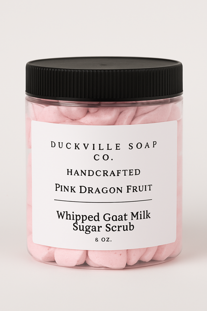 Whipped goat milk sugar scrub jar, Pink Dragon Fruit label, black lid, pink flakes