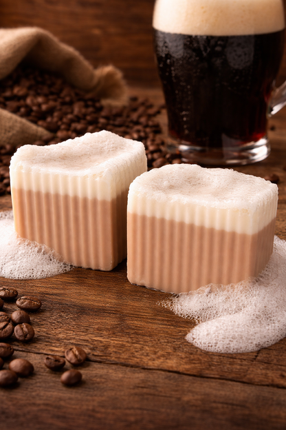 Beer soap bars, beige with suds, on wooden surface