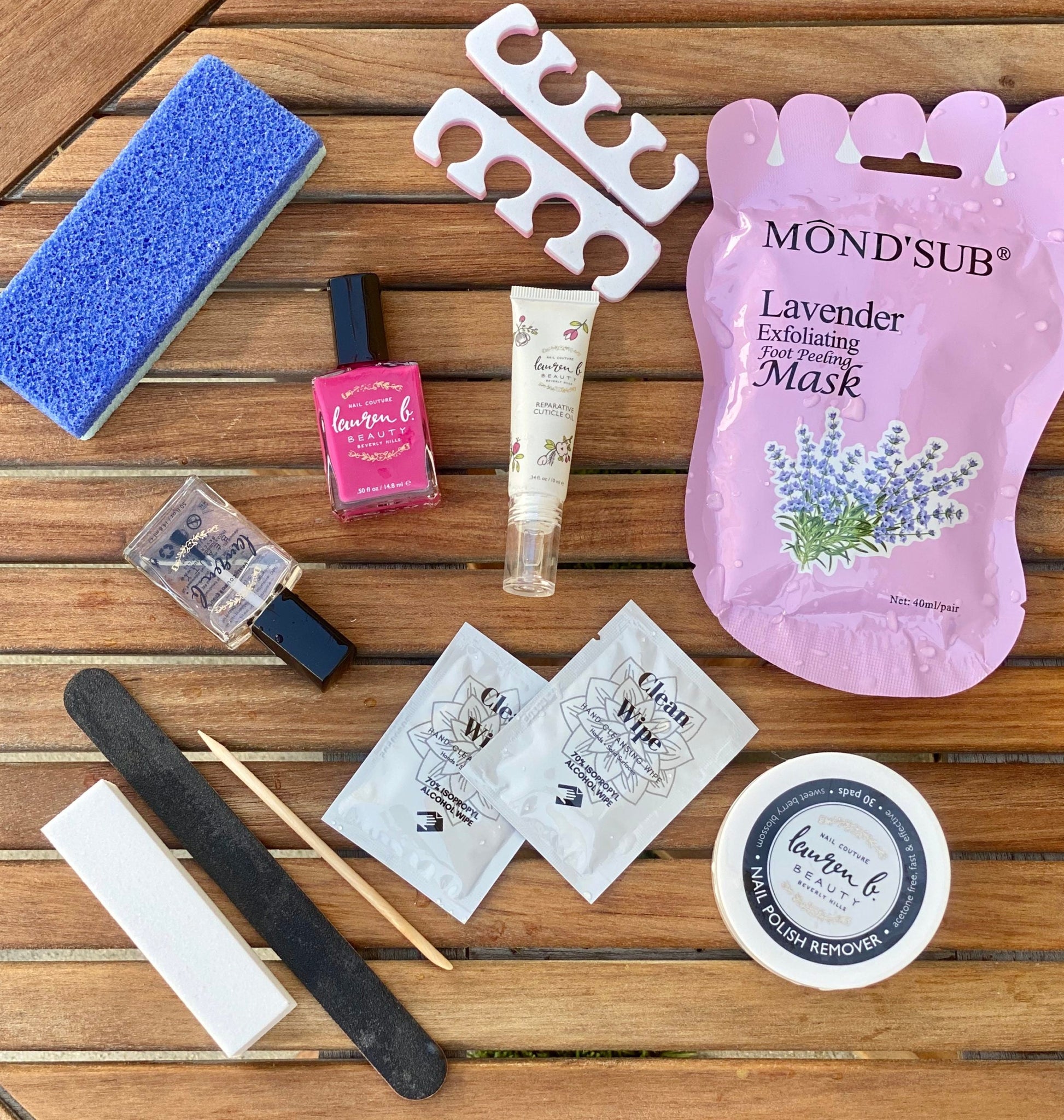 DIY pedicure kit set with foot exfoliating mask, files, oil, and tools