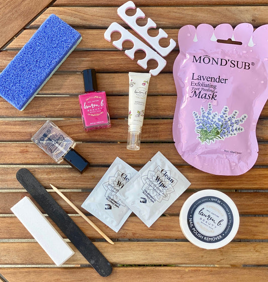 DIY pedicure kit set with foot exfoliating mask, files, oil, and tools
