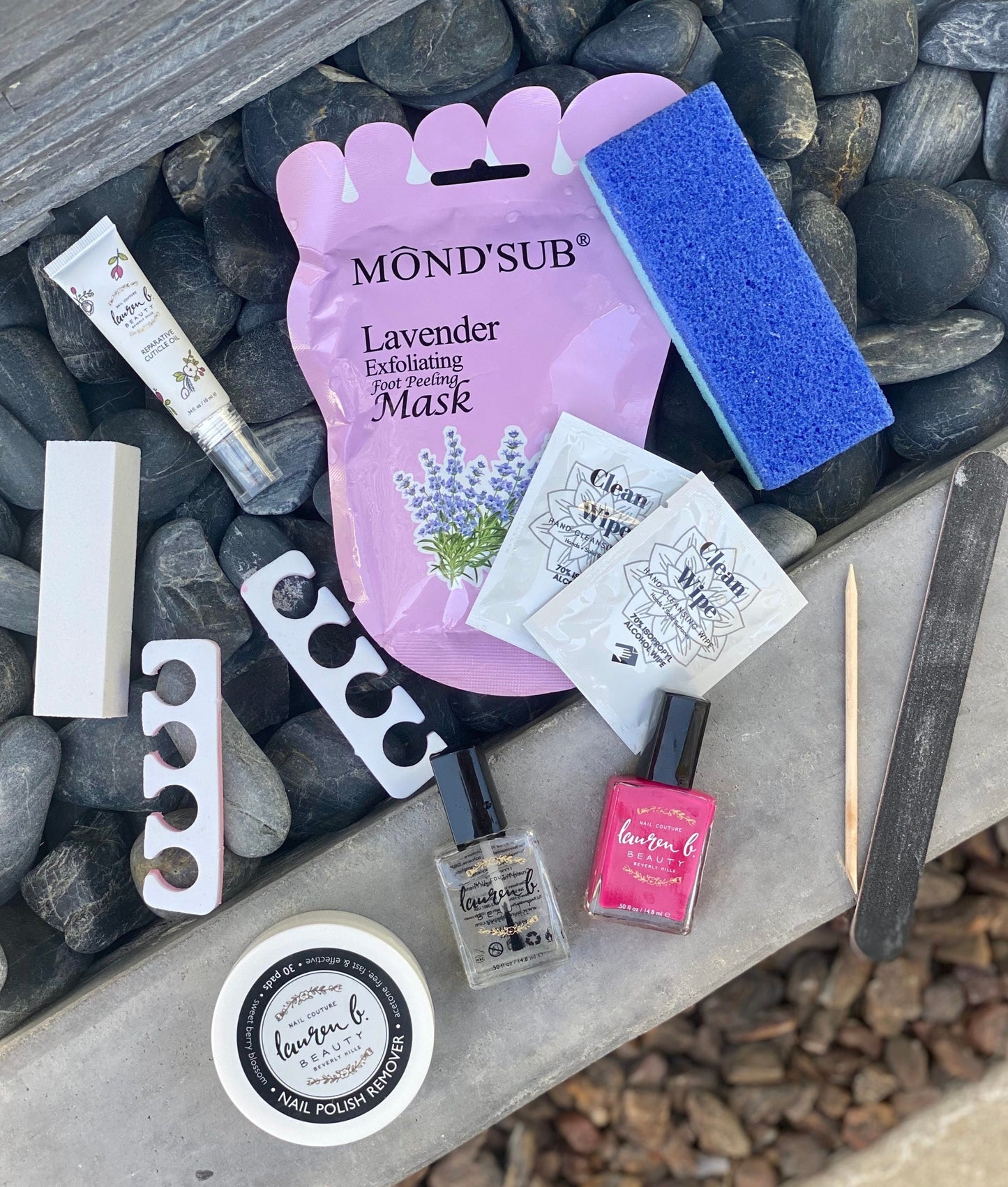 Lavender foot exfoliating mask set with sponge, mini bottles, and tools
