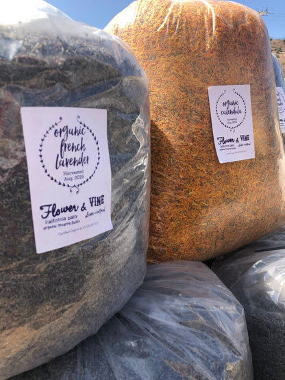 Organic lavender sachet sacks with printed brand labels, bundled in clear wrap