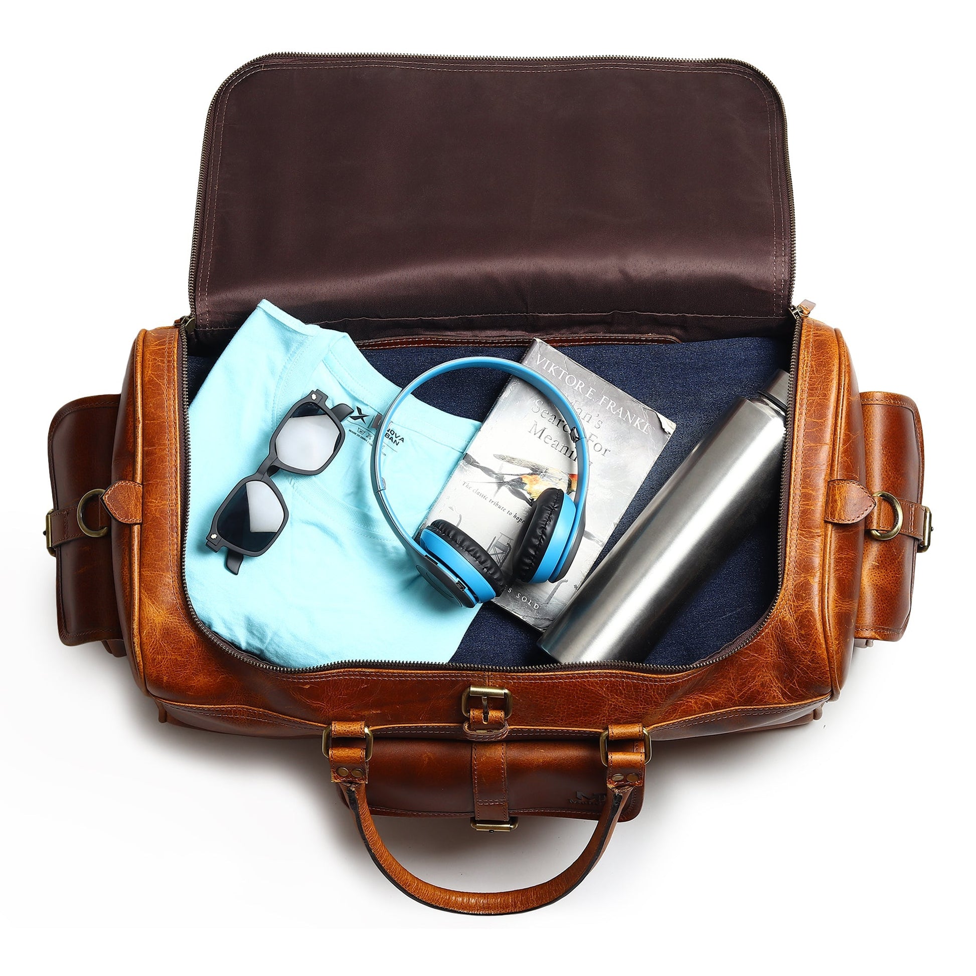 Berlin leather weekender duffle bag in brown leather with open top showing padded interior