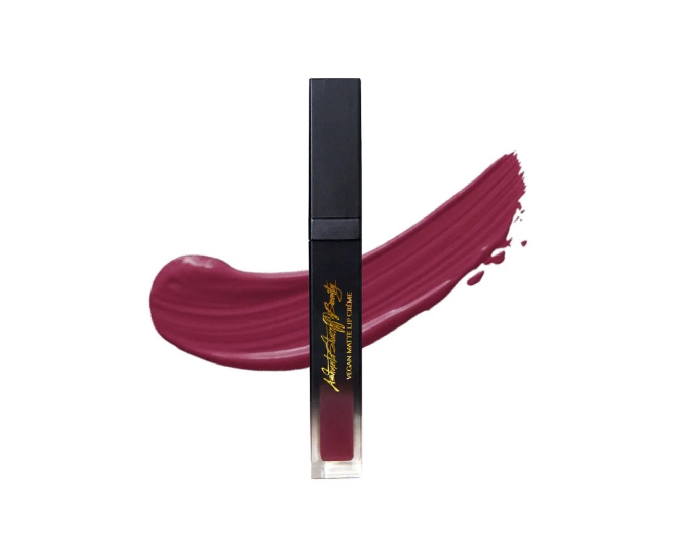 Matte lip creme tube with berry pink liquid lipstick swatch.
