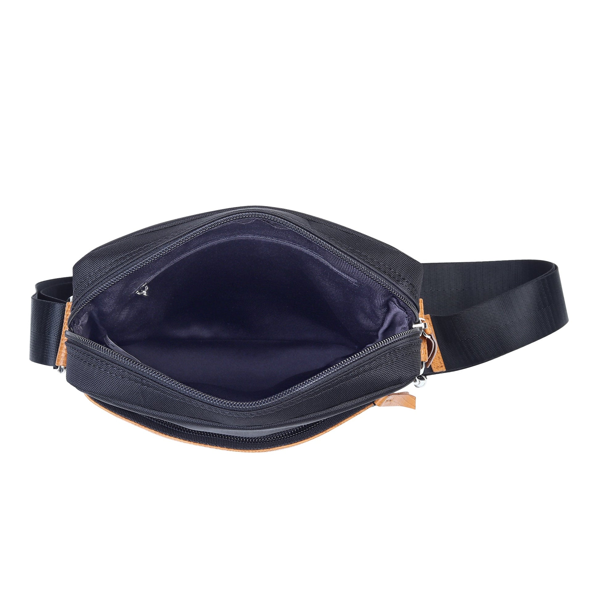 Navy-blue canvas sling bag with zipper opening and tan trim, worn as a crossbody