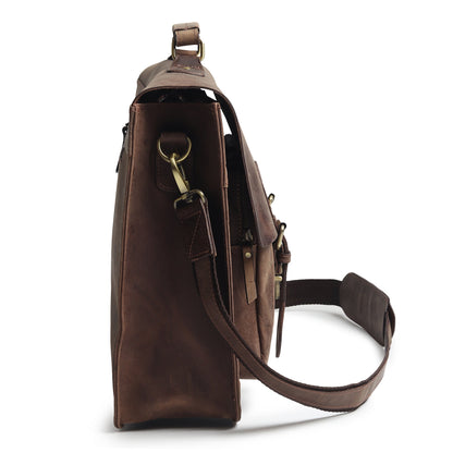 Brown buffalo leather messenger bag side view with handle, strap attachment, and front hardware.