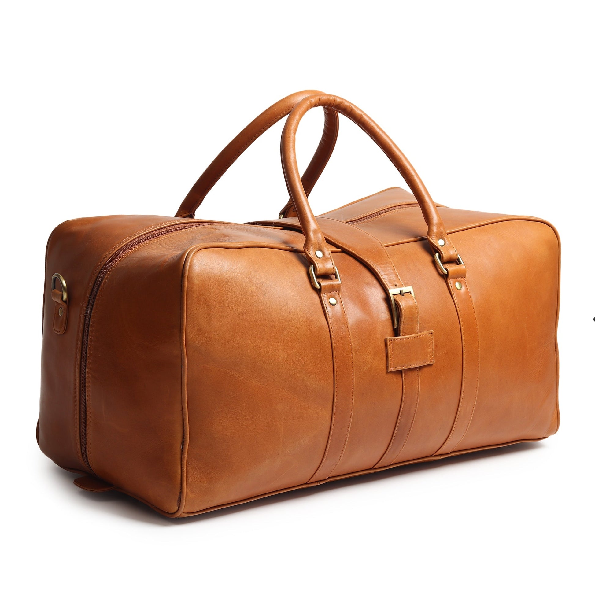 Tan leather duffle bag with top handles and front buckle strap, angled view