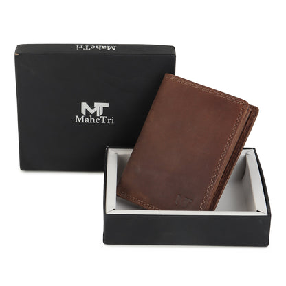 Men's brown leather wallet beside gift box with MaheTri logo.