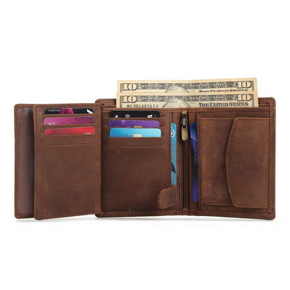 Men's leather wallet opened, showing multiple card slots and bill compartment.