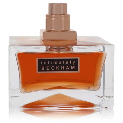 Intimately Beckham men's cologne bottle with orange front panel and rose-gold cap