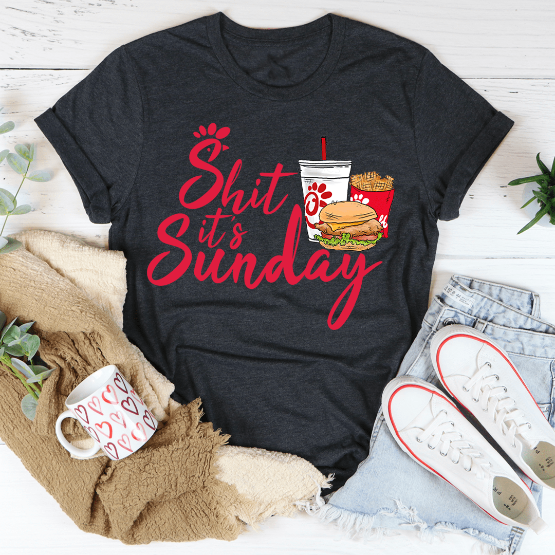 Black crewneck T-shirt with red "Shit It's Sunday" text and paw print graphic