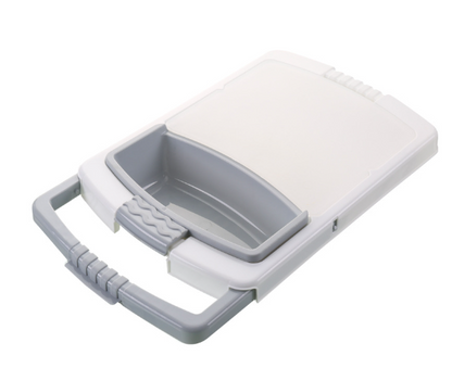 Plastic chopping board with white lid and gray draining tray insert