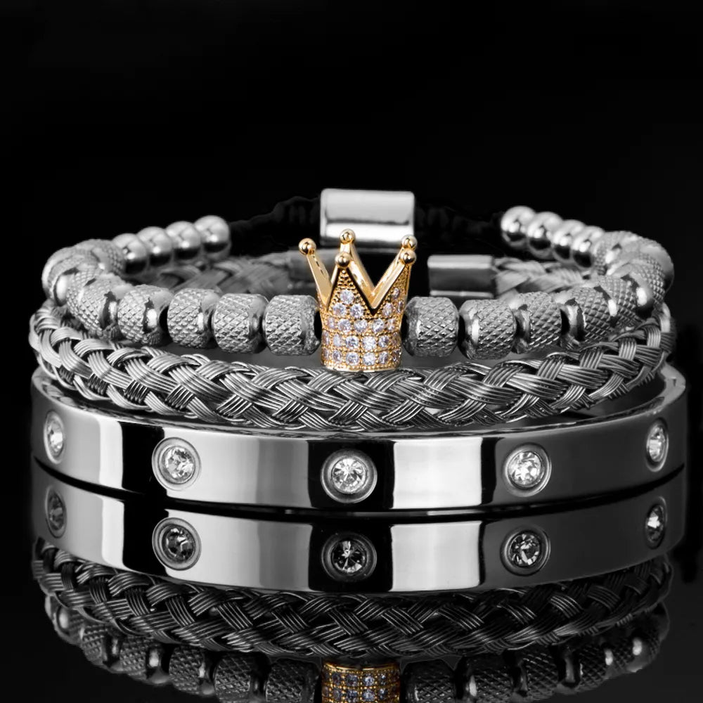 Silver braided Roman bracelet with diamond studs and gold-tone crown centerpiece