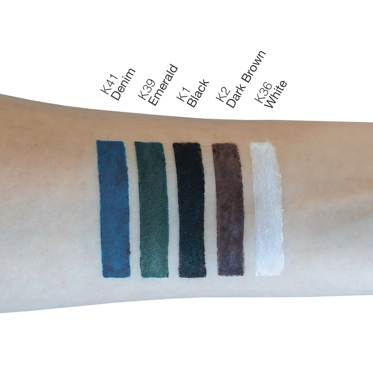 Dark brown eyeliner swatch on skin among multiple color shades